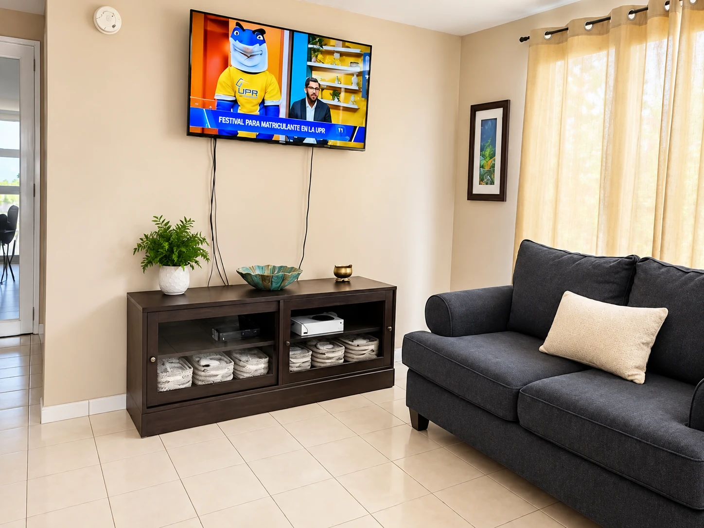 Área de sala con televisor